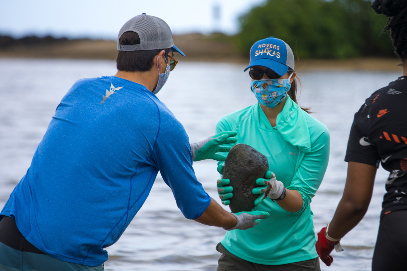 Learning about Hawaiian aquaculture at Huilua Fishpond with 808 Cleanups.